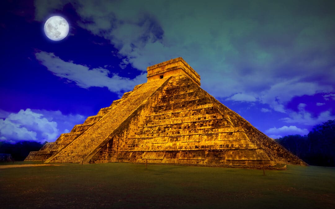 The pyramid of Kukulcan at Chichen Itza at full moon